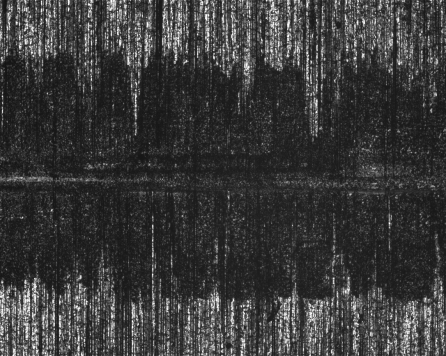 Micrograph of wear resistance scar - ASTM G133 test on stainless steel